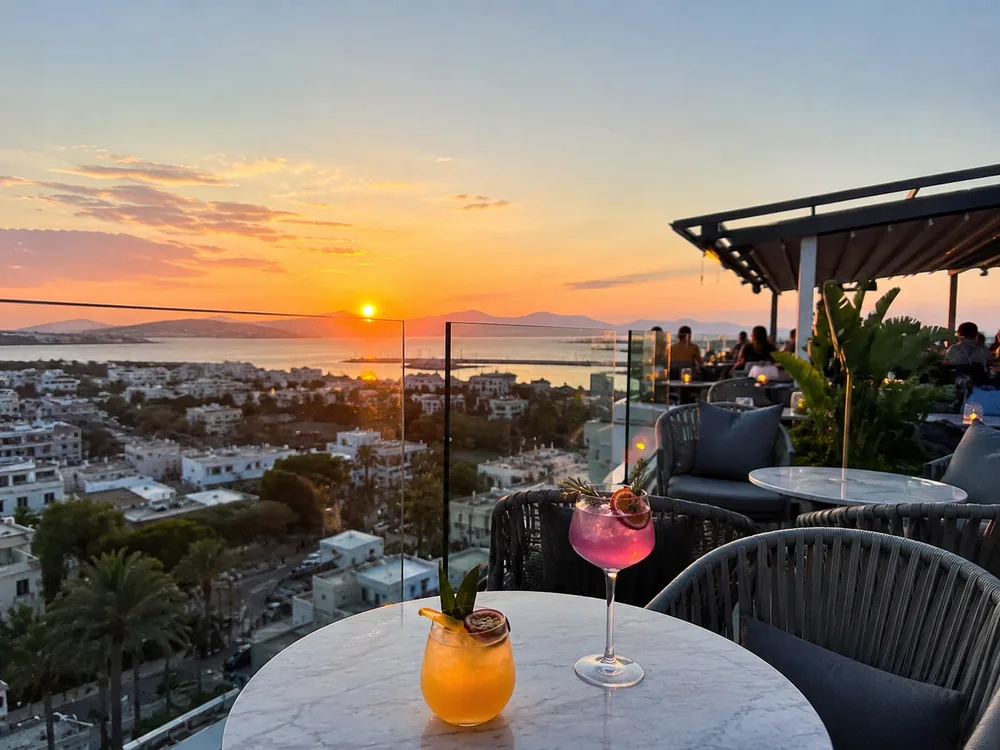 Sunset rooftop atmosphere inspired by Omega Sky in Kos